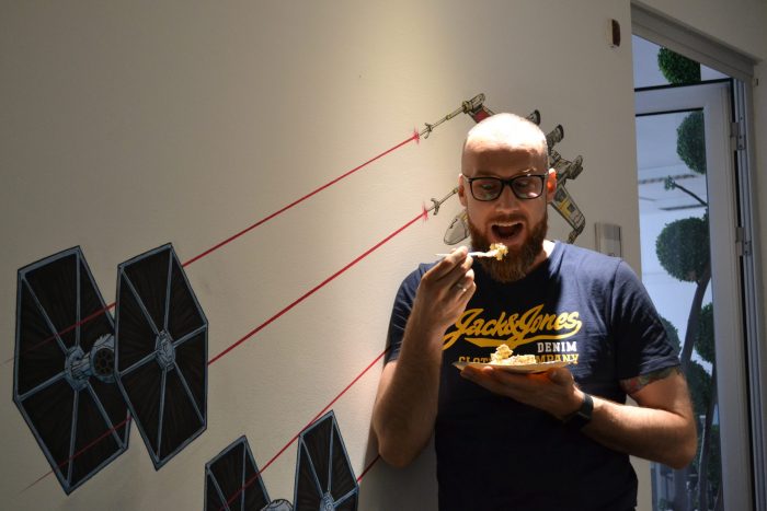 a man eating a cake